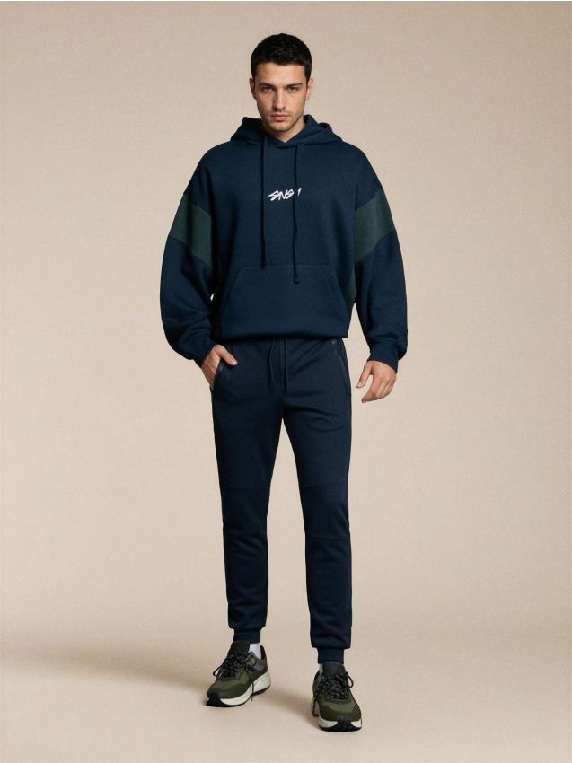 Sinsay - Sportowe spodnie dresowe z przeszyciami - granatowy
