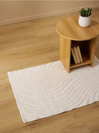 Vaip reljeefsete lainetega ja puuvillaga