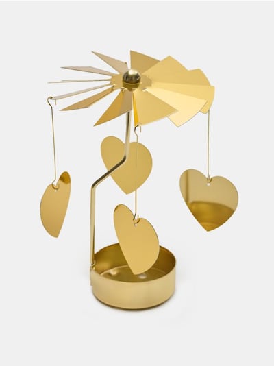 Drehbarer dekorativer Kerzenhalter mit Herzmotiv