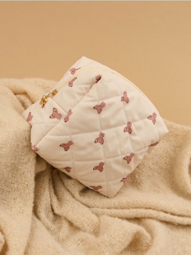 Sinsay - Prešívaná kozmetická taštička - krémová