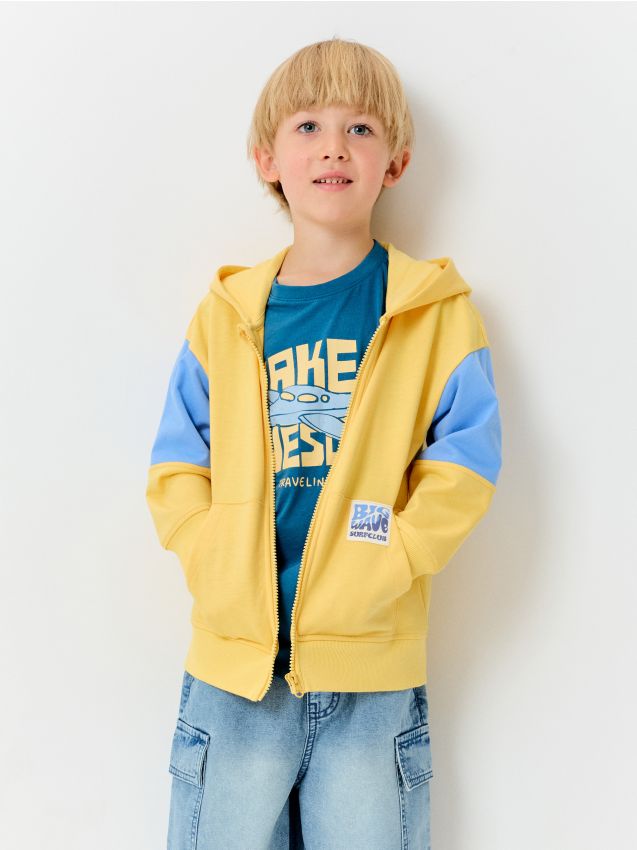 Top da jogging con zip e cappuccio - giallo