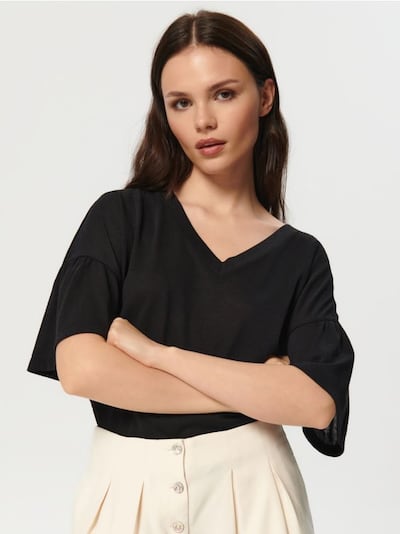 Bluse mit Rüschen