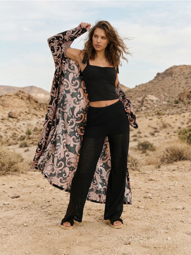 Sinsay - Pantaloni din tricot flare cu șorturi integrate - negru