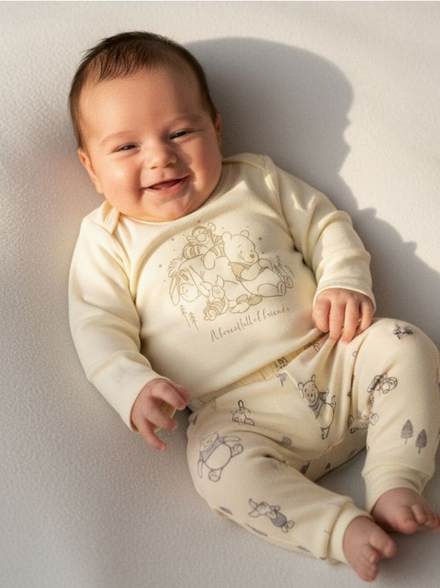 Sinsay - Nohavice s flísovou podšívkou Winnie the Pooh - krémová