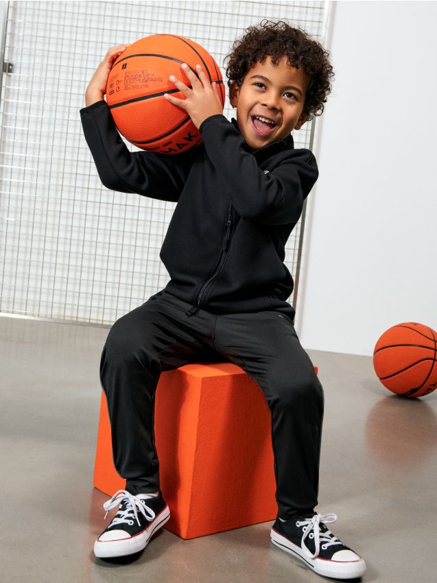 Sinsay - Pantaloni sport slim Active cu elemente reflectorizante - negru