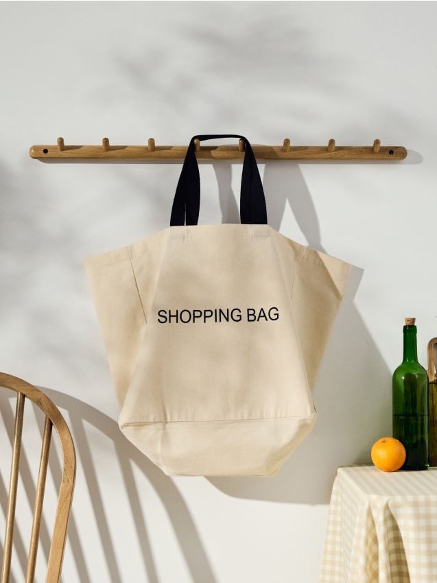 Sinsay - Geantă shopper din bumbac cu inscripție - crem