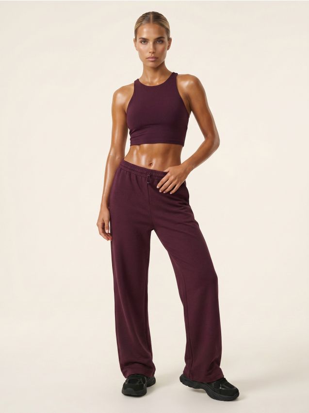 Sinsay - Pantaloni cu croială largă, cu amestec de vâscoză, soft touch Active - bordo