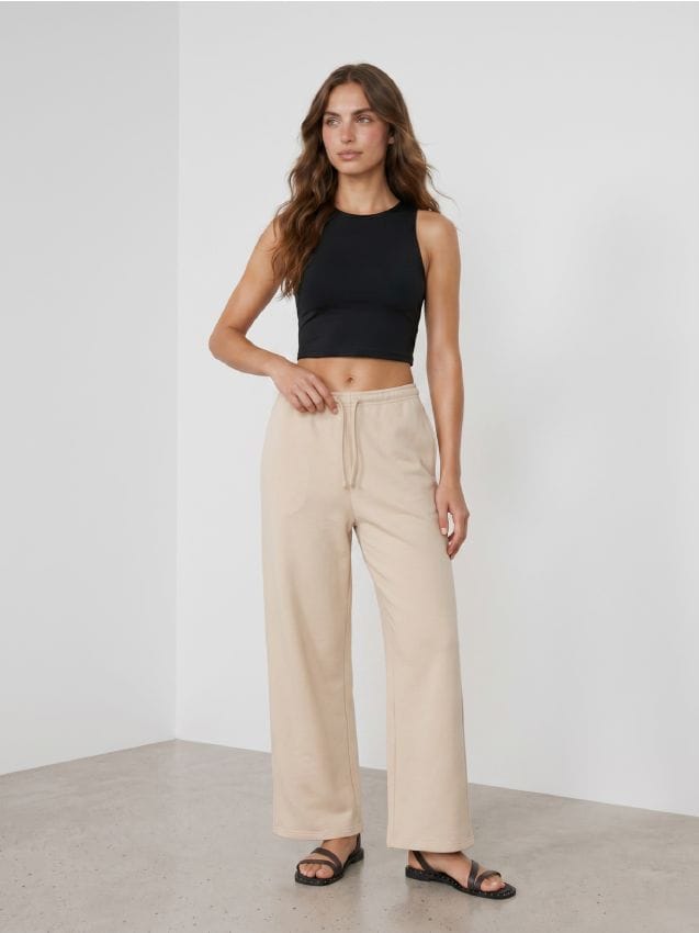 Sinsay - Pantaloni de trening cu crac larg - bej