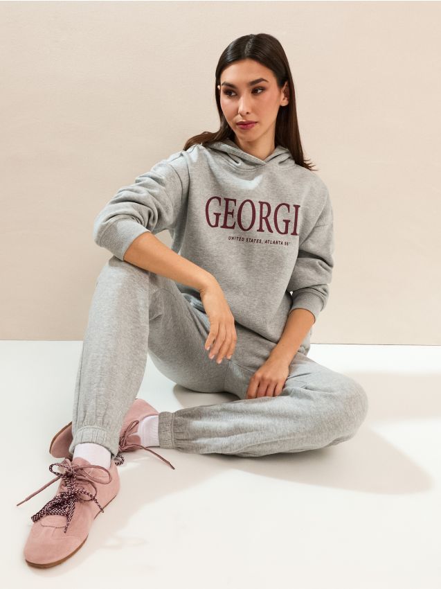 Sinsay - Spodnie jogger fleece z nadrukiem - szary