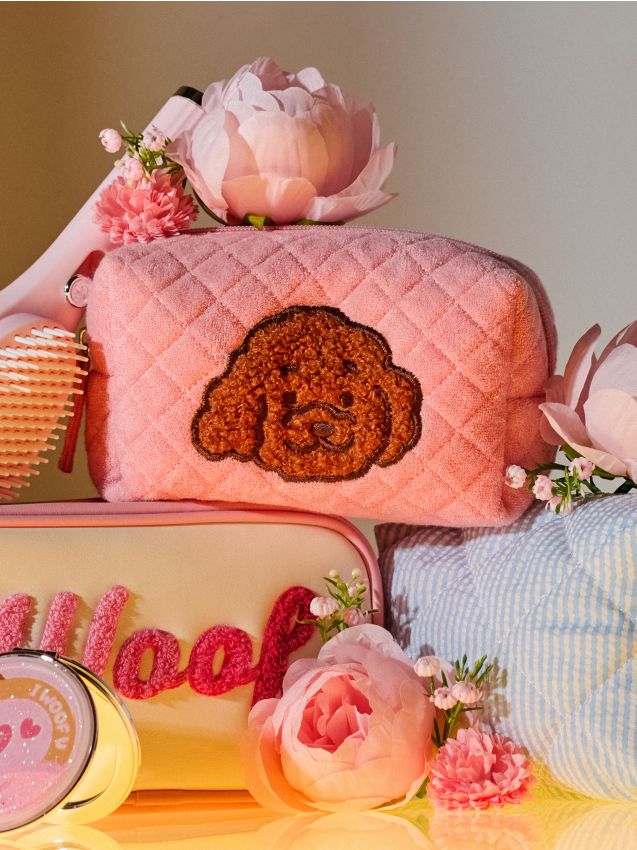 Sinsay - Borsetă cosmetică matlasată cu aplicație în formă de câine - roz-pastel