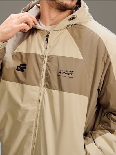 Водонепроникна куртка color block з капюшоном