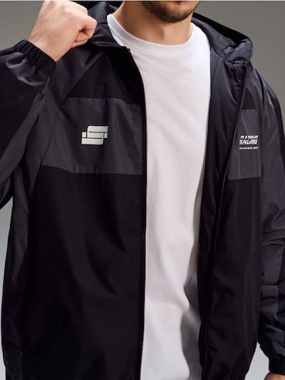 Водонепроникна куртка color block з капюшоном