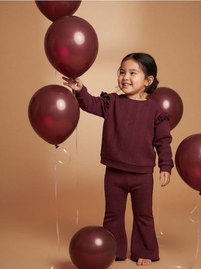 Φούτερ με λεπτομέρειες από βολάν