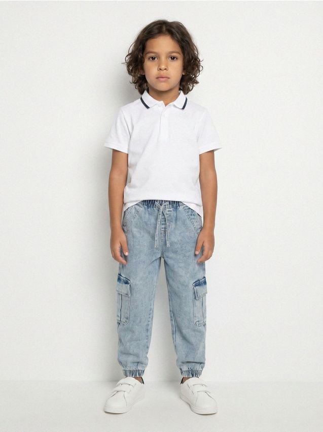Sinsay - Jeansy jogger comfort cargo z efektem sprania - niebieski