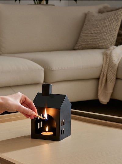 Świecznik w kształcie domku