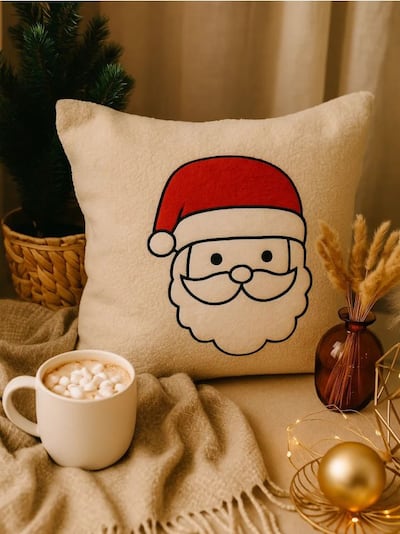 Poduszka świąteczna z motywem świętego Mikołaja
