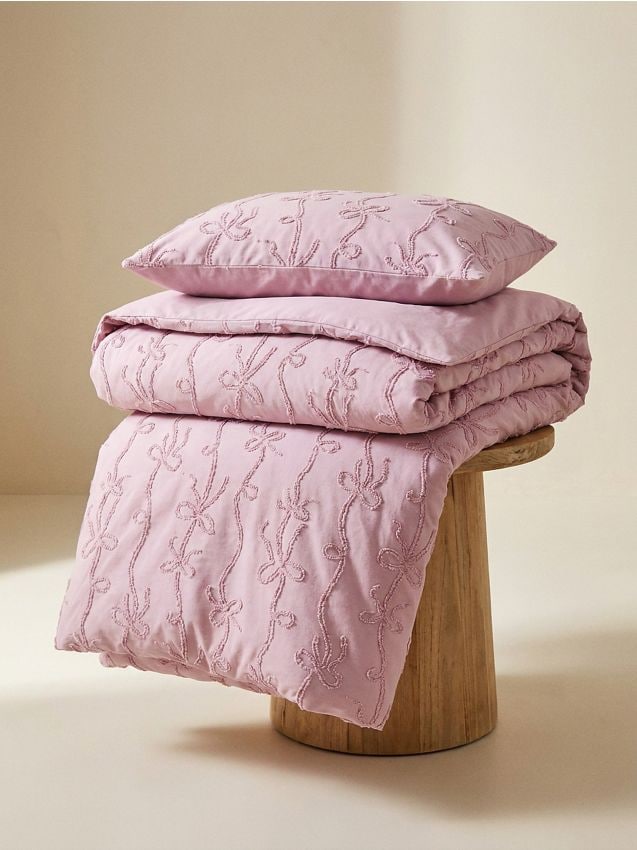Sinsay - Set de lenjerie de pat reversibilă cu fundițe decorative - roz-trandafiriu