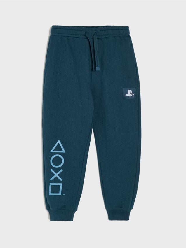 Sinsay - Pantaloni sport jogger PlayStation - bleumarin