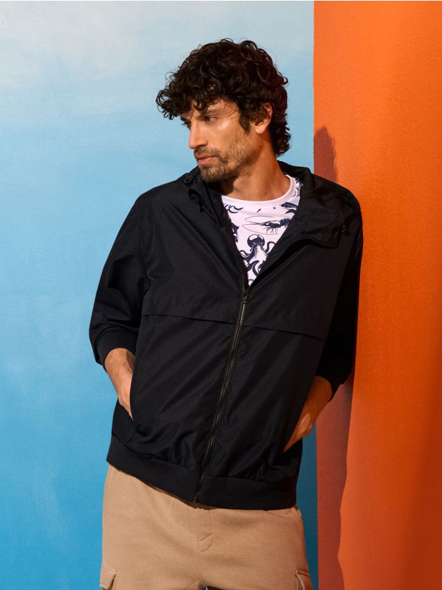 Sinsay - Jachetă tehnică cu glugă și manșete elastice - bleumarin