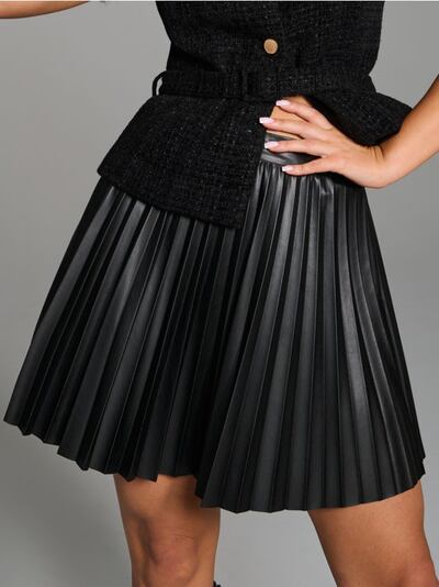 Плісирована міні-спідниця