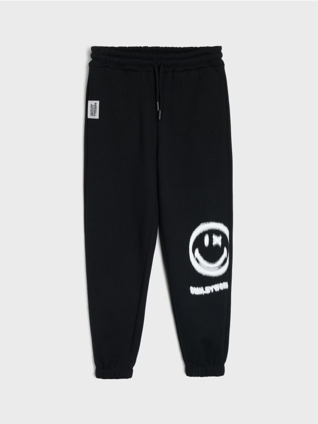 Sinsay - Pantaloni lejeri cu imprimeu SmileyWorld® - negru
