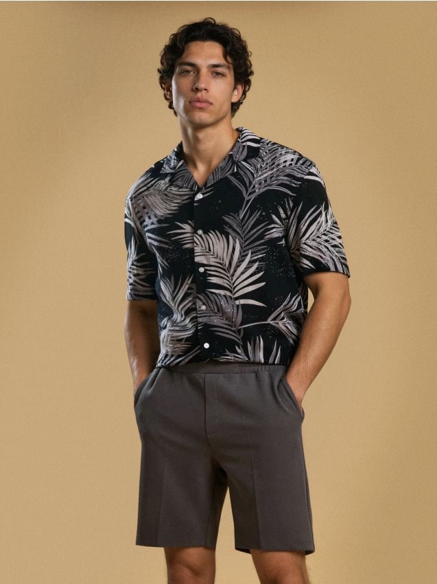 Sinsay - Pantaloni scurți slim - albastru metalizat