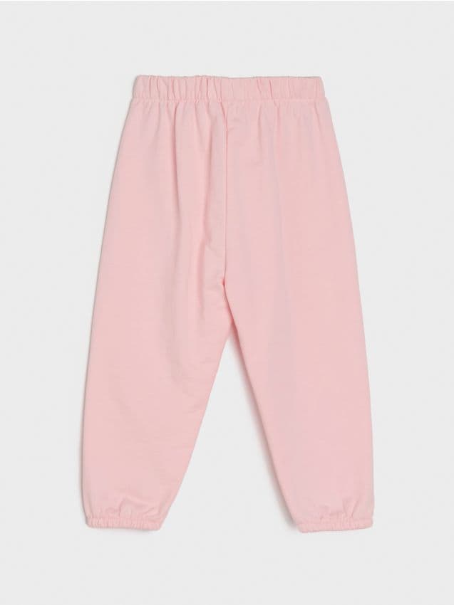 Pantaloni din materiale combinate