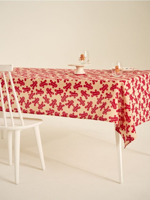 Sinsay - Vianočný obrus s motívom perníkového panáčika - béžová