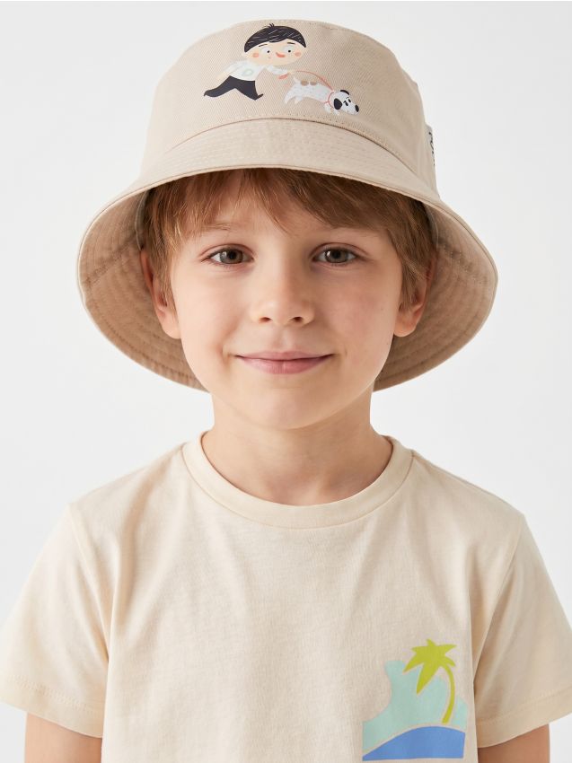 Sinsay - Bucket hat din bumbac cu imprimeu Pucio - nude