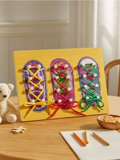 Jalanõude paelte harjutustahvel