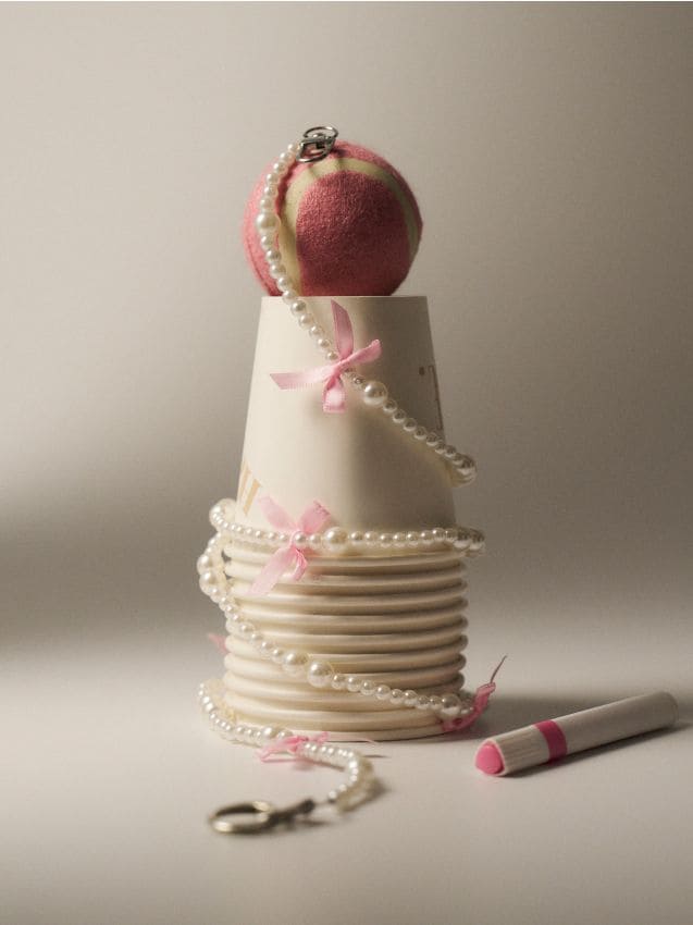 Sinsay - Lănțișor pentru telefon cu perle și fundițe - roz