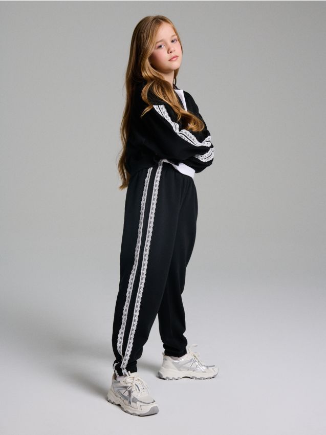 Sinsay - Nohavice s pruhom - čierna