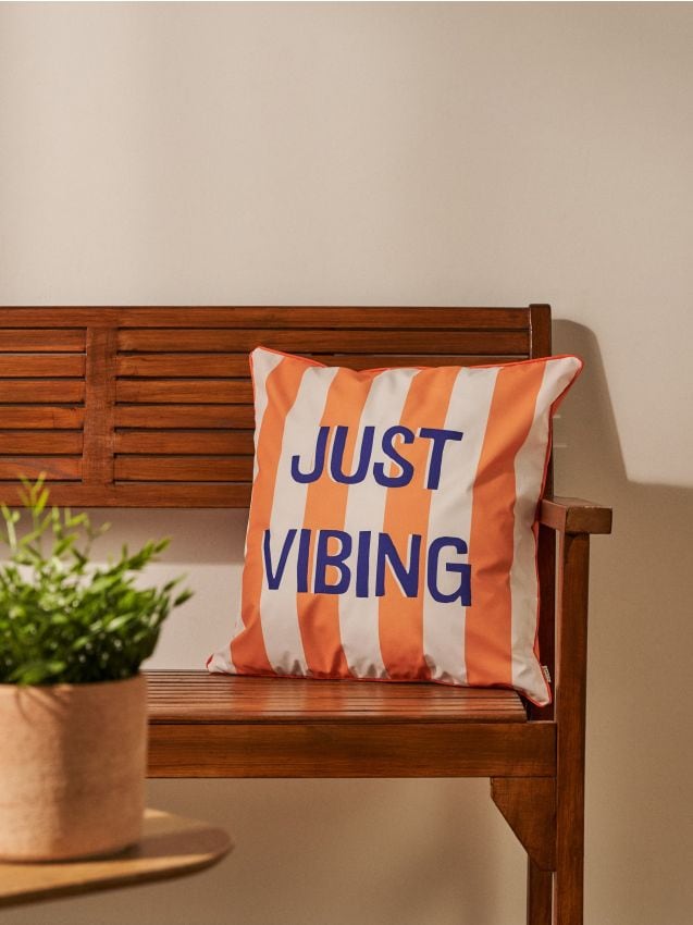 Sinsay - Față de pernă cu inscripția „Just Vibing” - portocaliu