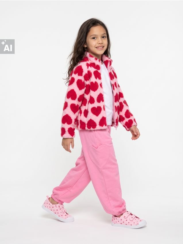Sinsay - Pantaloni de trening oversize cu buzunare în formă de inimă - roz-aprins