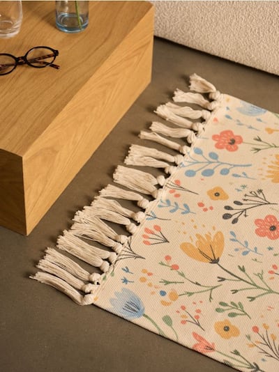 Teppich mit Blumenmuster und Fransen