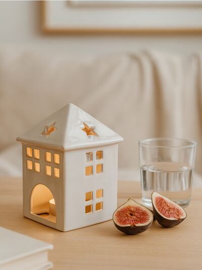 Svícen ve tvaru domečku