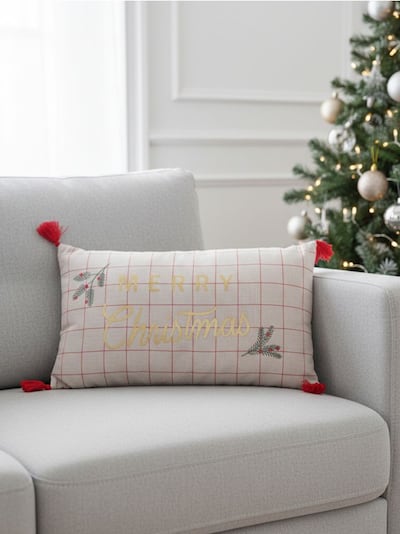 Cuscino natalizio con il testo „Merry Christmas”