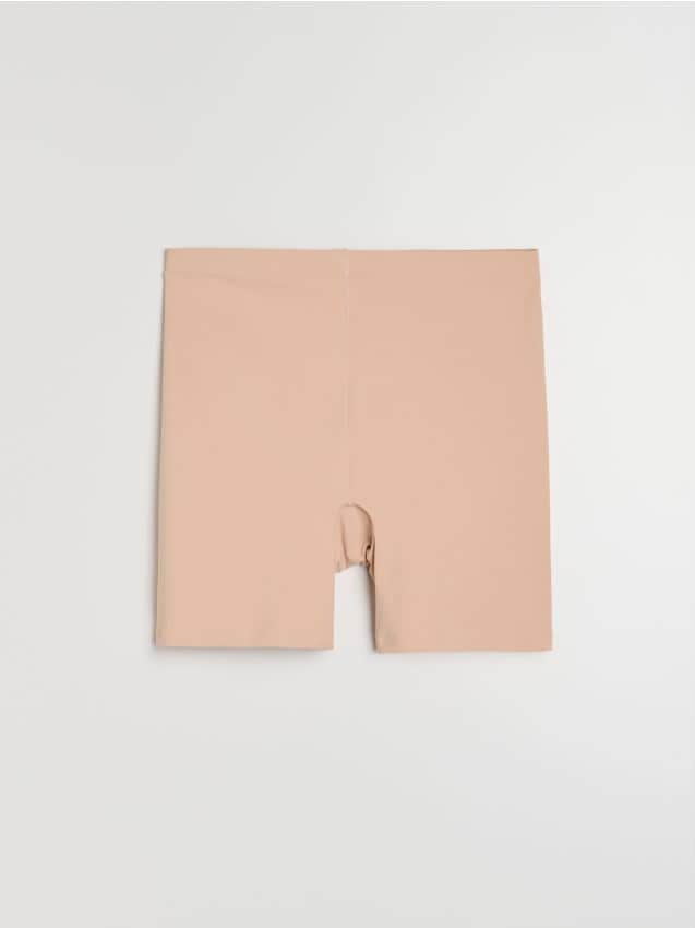 Sinsay - Szorty modelujące z silikonową taśmą na nogawkach - kremowy