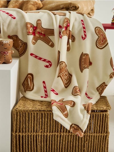 Koc z motywem świątecznym w pierniczki