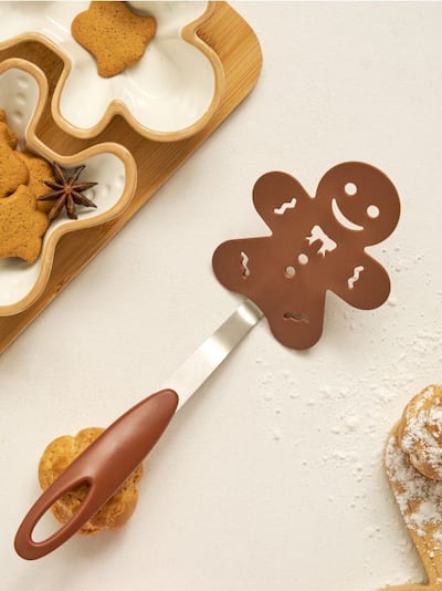 Łopatka kuchenna w kształcie piernikowego ludzika
