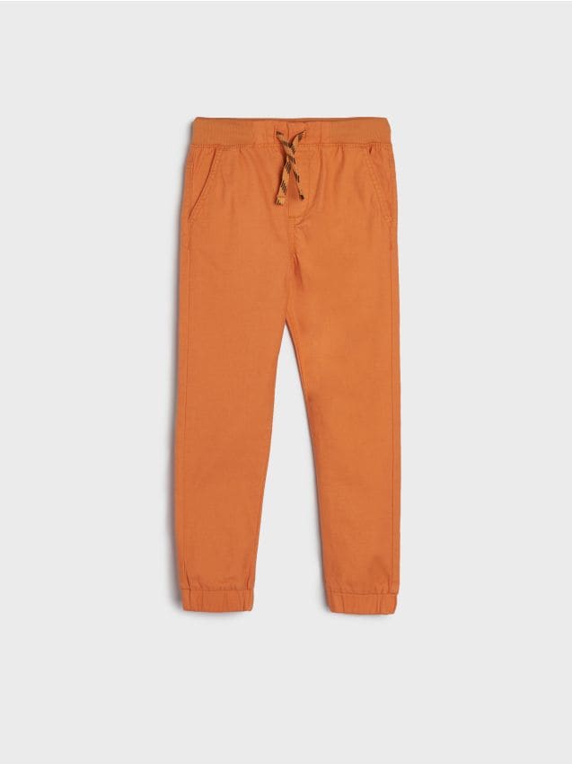Jeansy jogger Kolor pomarańczowy - SINSAY - 4374T-28X