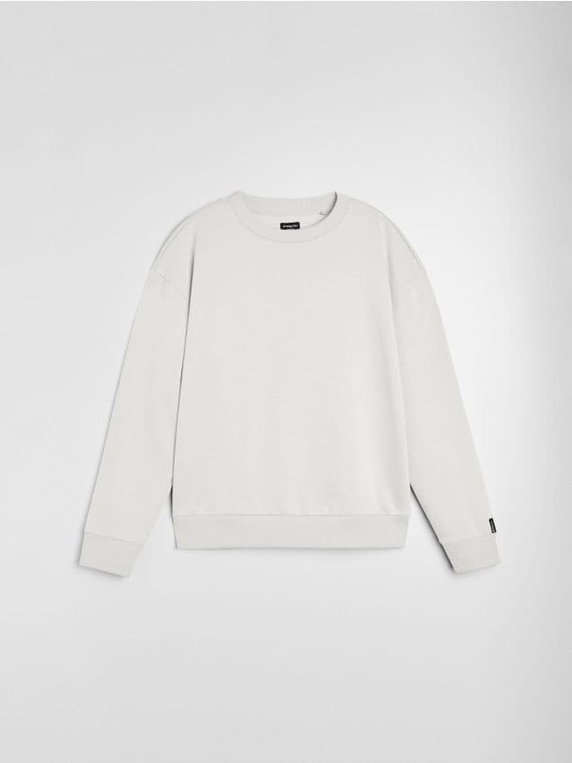 Sinsay - Bluza crewneck comfort fit z domieszką bawełny - kremowy