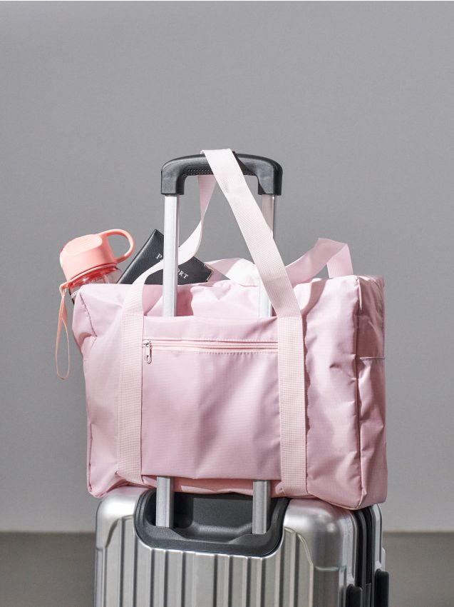 Sinsay - Geantă de călătorie cu buzunare - roz