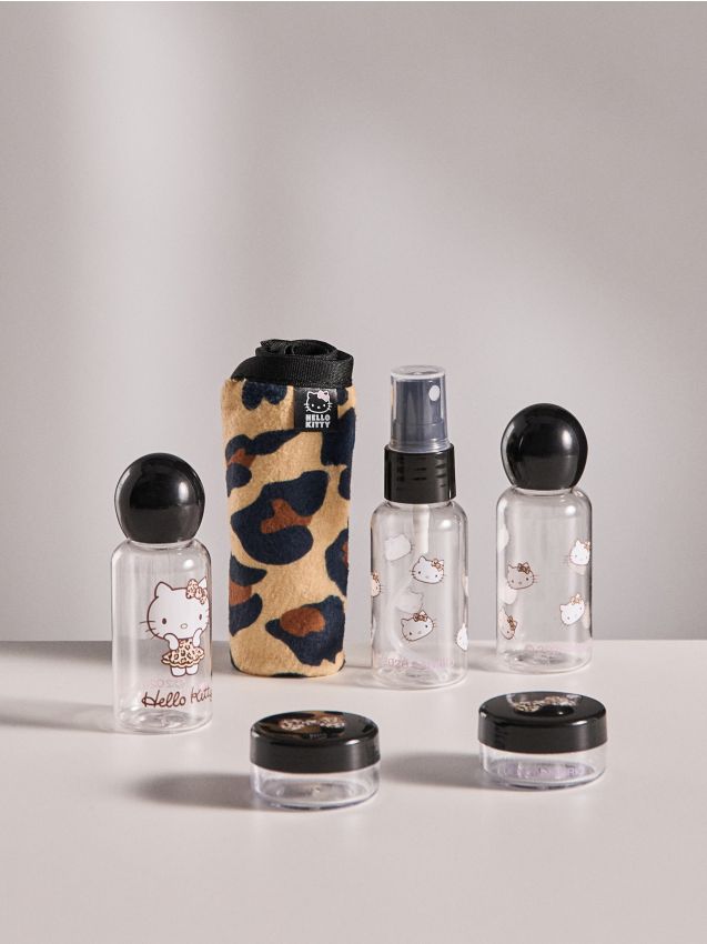 Sinsay - Set de recipiente de călătorie cu prosop de față și etui transparent Hello Kitty - negru