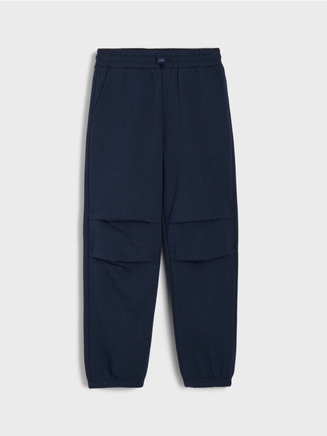 Sinsay - Pantaloni parachute din material sport cu elastic și cordon în talie - bleumarin