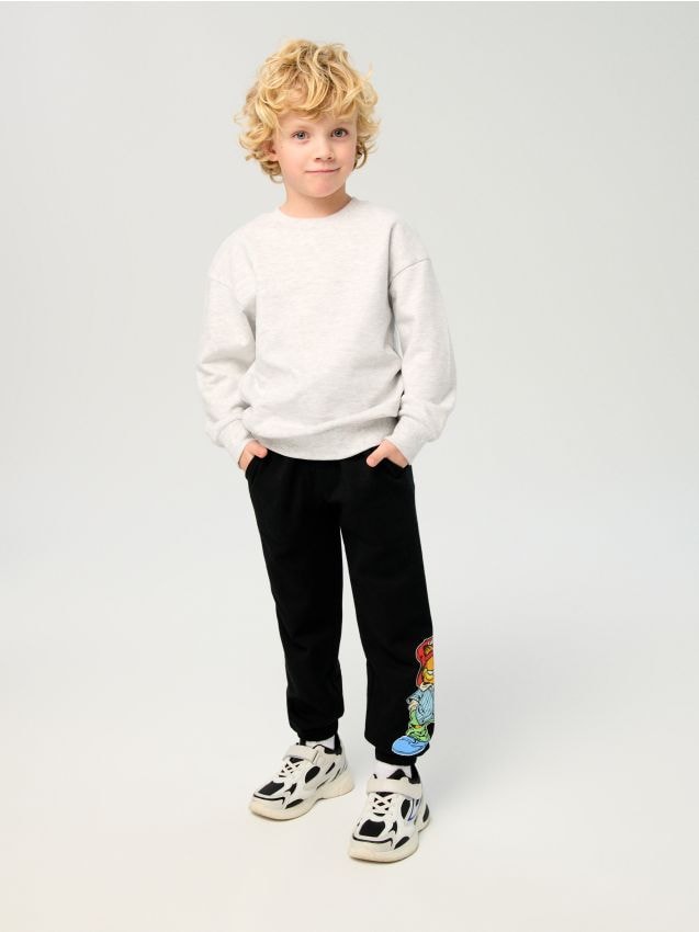 Sinsay - Spodnie dresowe jogger Garfield - czarny