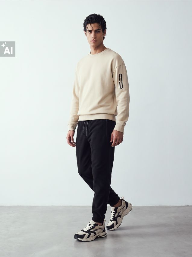 Sinsay - Bluză crewneck cu buzunar pe mânecă - nude