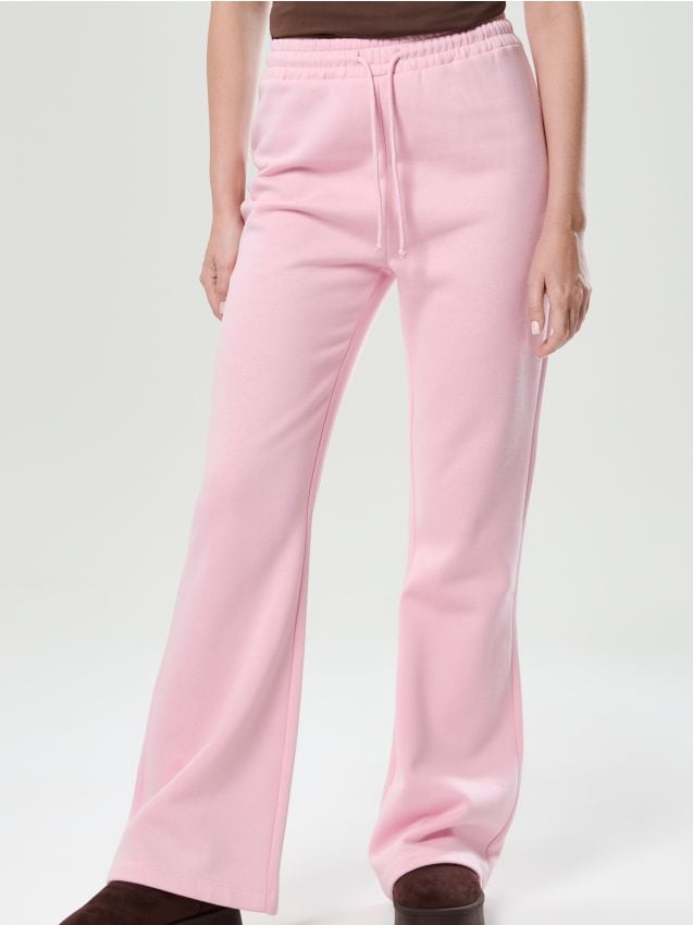 Sinsay - Flare nohavice - pastelová ružová