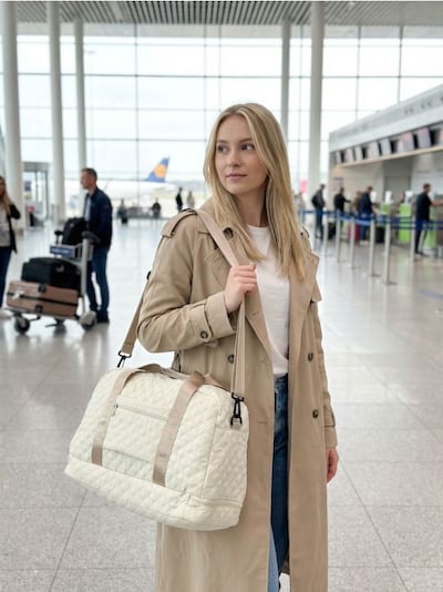 Стьобана дорожня сумка з ручками