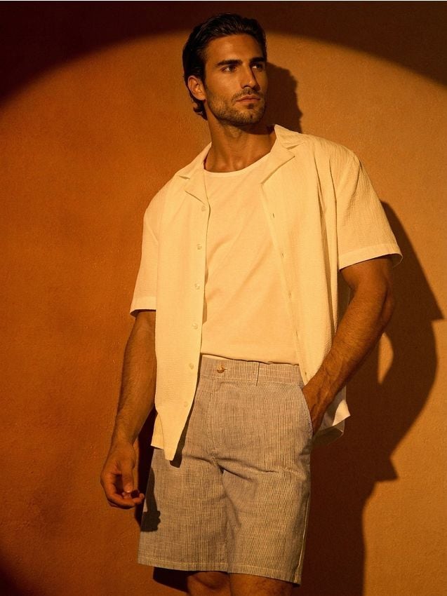 Sinsay - Pantaloni scurți chino în dungi - bleumarin